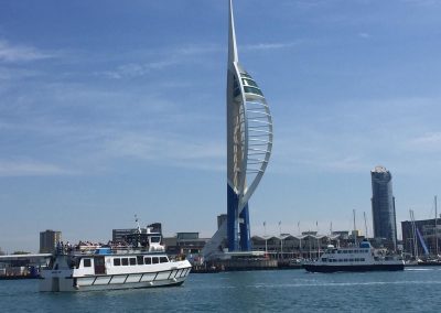 Boat in front of Spinnaker Tower